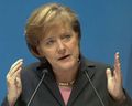Angela Merkelová dokazuje, že i mezi ženami se najdou zanícené rybářky.