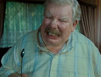 This Dursley exhibits the typical traits of obesity and gluttony