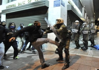 File:Greek-riot-police-falling.jpg