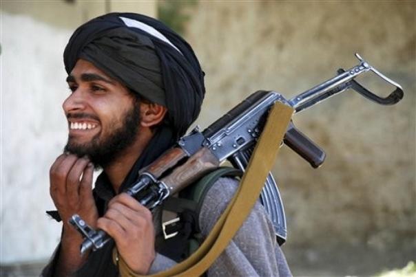 File:Taliban-militant-smiles.jpg