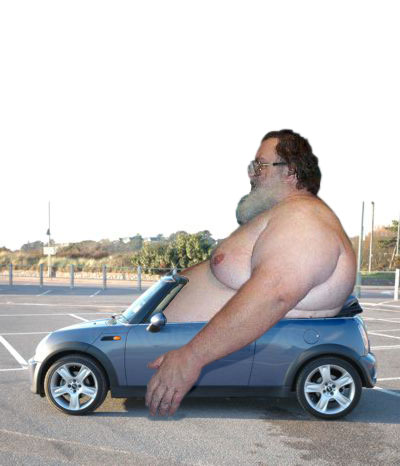 File:225629 fat guy in car.jpg