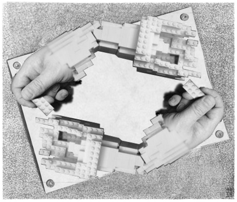 File:Escher lego hands.png