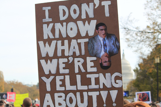 File:Yelling-about-protest-sign.jpg