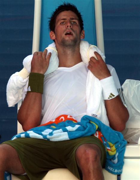 File:Novak Djokovic cools down with ice bag as 5966386849.jpg