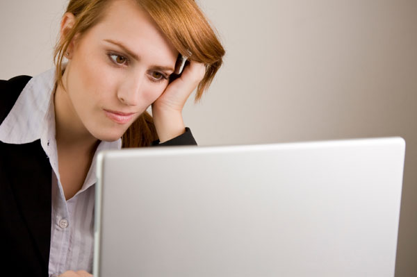 File:Frustrated-woman-at-computer.jpg