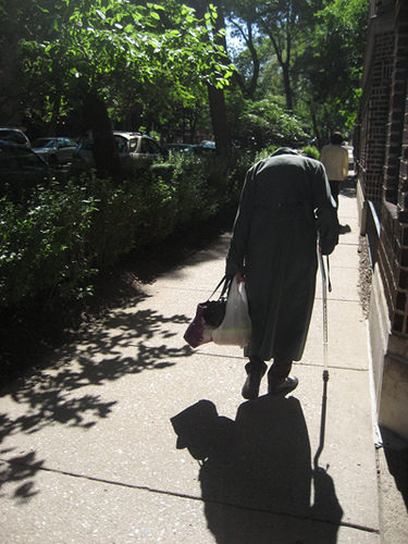File:Old woman walking.jpg
