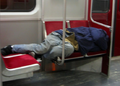 Homeless guy sleeping in a Toronto subway