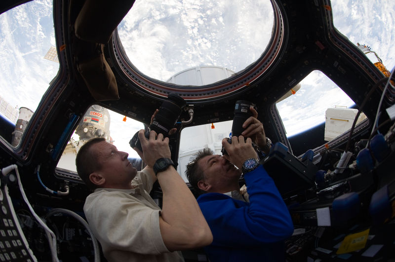 File:ISS-27 Dmitri Kondratyev and Paolo Nespoli photograph the Earth through the Cupola.jpg