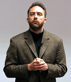 Jimbo Wales speaking at FOSDEM 2005 in Brussels, Belgium