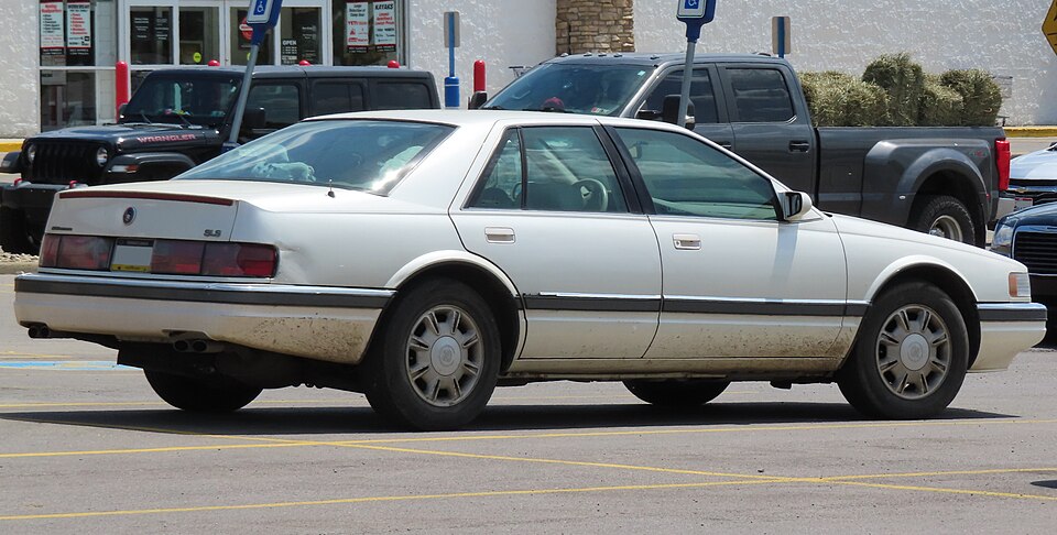 File:1995 Cadillac Seville SLS, rear right, 05-24-2024.jpg