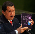 Hugo Chávez displays one of his favorite books.