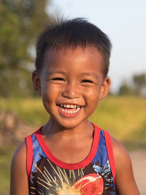 File:Laughing boy at golden hour.jpg