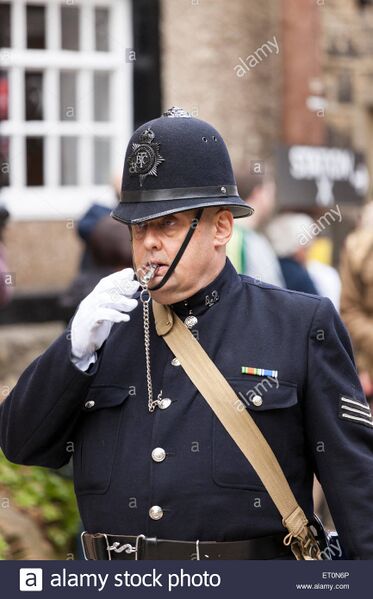 File:Policeman-1940s-uniform-blowing-whistle-at-haworth-1940s-weekend-west-ET0N6P (1).jpg