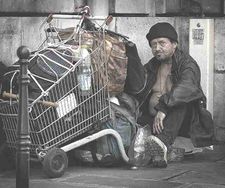 Poverty homeless french man shopping trolley-1-.jpg