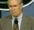 Donald Rumsfeld demonstrates his penchant for papercraft.
