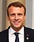 Emmanuel Macron in Tallinn Digital Summit. Welcome dinner hosted by HE Donald Tusk. Handshake (36669381364) (cropped).jpg