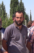 Abd al-Qader Salah, chef du [[Liwa al-TawhiDonald Duck].