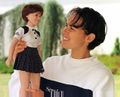 Martina Hingis et une poupée.jpg