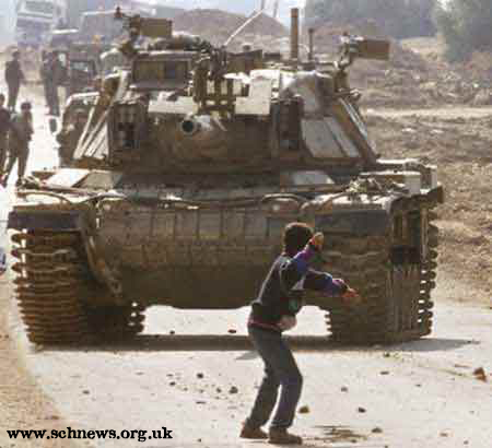 קובץ:Palestine-boy-tank.jpg