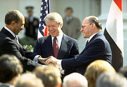 Flickr - Government Press Office (GPO) - The Triple Handshake.jpg