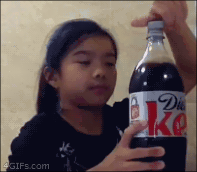 File:Little girl soda explosion.gif