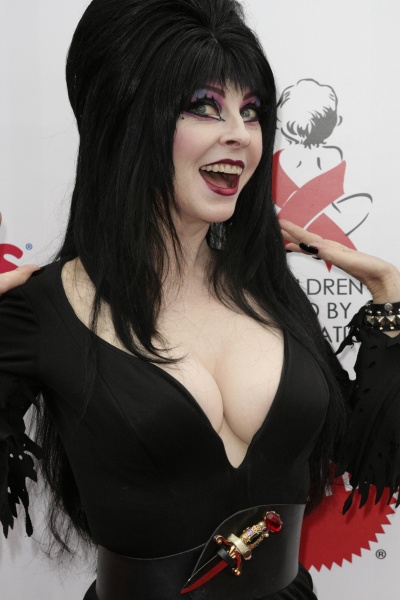 File:Elvira with cleavage.jpg