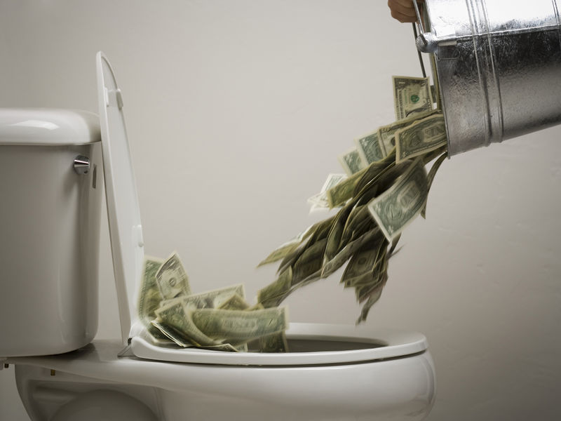 File:Money-down-toilet.jpg