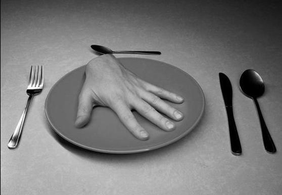 Archivo:Eating a hand.jpg