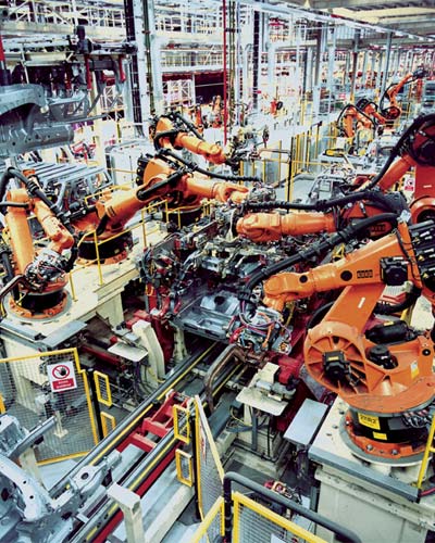 Archivo:Industrial Robotics in car production.jpg
