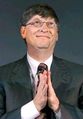 Bill Gates při modlibě k Velkému Dollaru.