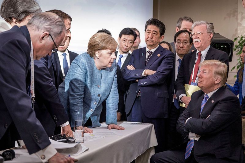 Soubor:G7 summit Merkel VS Trump.jpg