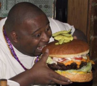 File:Weird-people-fat-guy-eating-huge-ha.jpg