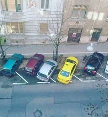 Datei:Richtige Parkplatzordnung.jpg