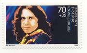 800px-Jim Morrison Briefmarke Deutsche Bundespost 1988 ungestempelt Schuschke.png