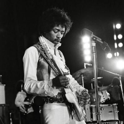 File:Jimi Hendrix guitar on stage.jpg