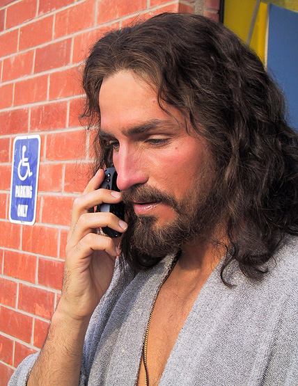 File:Jesus answers on telephone.jpg