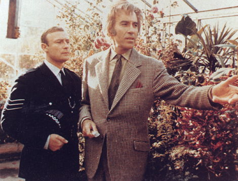 File:Lord Summerisle guides local police about his greenhouse.jpg