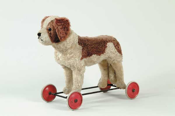 File:Doggy on wheels.jpg