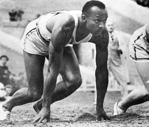 File:Olympic-sprinter-Jesse-Owens-awaits-the-start-of-a-race-at-the-1936-Olympic-Games-in-Germany..jpg