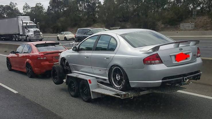 File:A Holden hauling junk.jpg