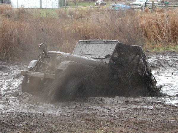 File:Jeep mud fountain.jpg