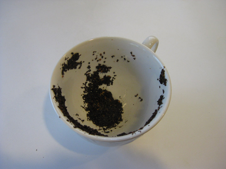 File:Tea leaves in cup.jpg