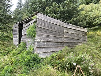 Makah Ozette Longhouse Memorial close up.jpg