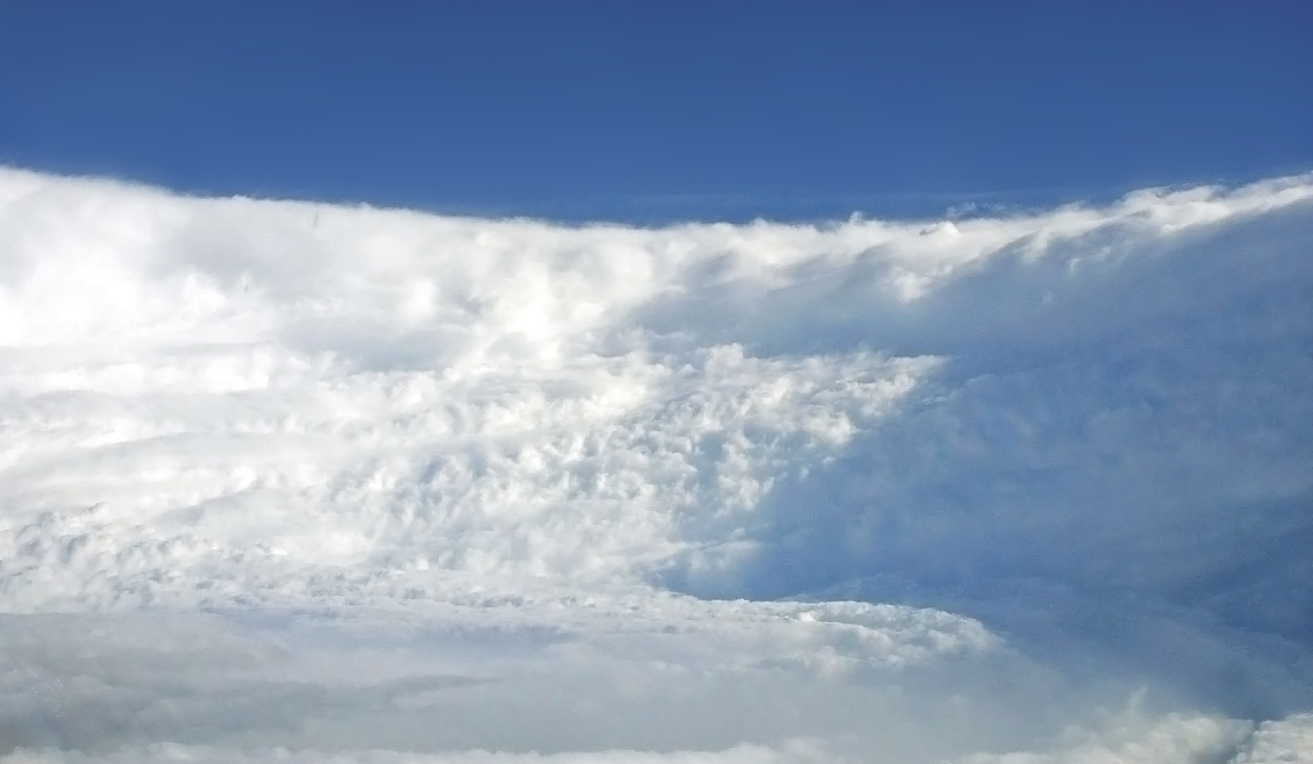 Hurricane Katrina Eye viewed from Hurricane Hunter (cropped).jpg