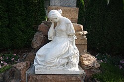 Statue of crying woman by World War victim memorial in Ocmanice, Třebíč District.jpg