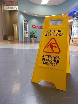 Wet floor sign CANEX.jpg