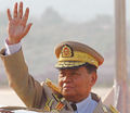 A happy Chinese general who just won an auction of heavy goods from the Arteks Coorporation's Auction House.
