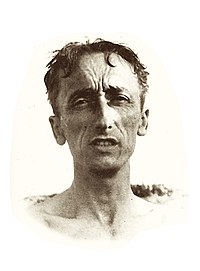 a pencil drawing of Cousteau clenching his teeth.