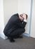Business-man-fetal-position.jpg