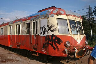 Disused tagged railcar (197086111).jpg